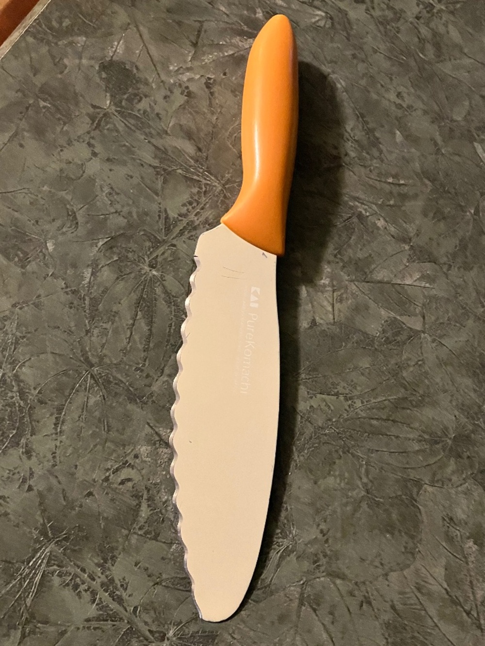 KAI PURE KOMACHI SERRATED CHEF'S KNIFE, HIGH CARBON STEEL, ORANGE HANDLE, SHARP